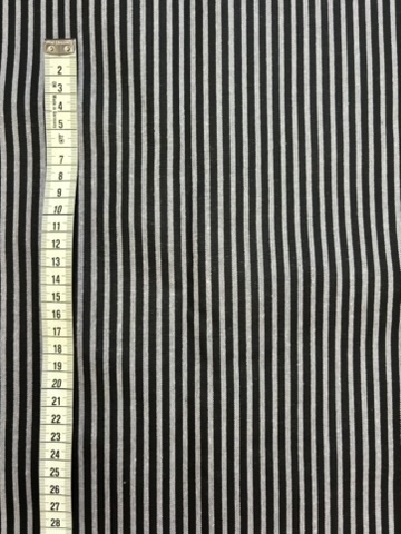 Raya Negra y gris jaspeada